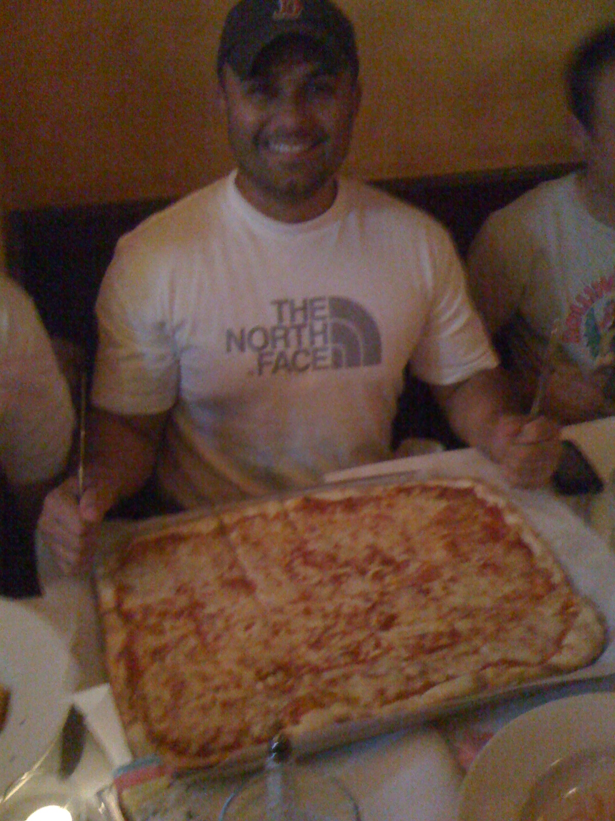 img_07421 Thieu orders a HUGE pizza, the cornerstone of a world-class athlete's diet!