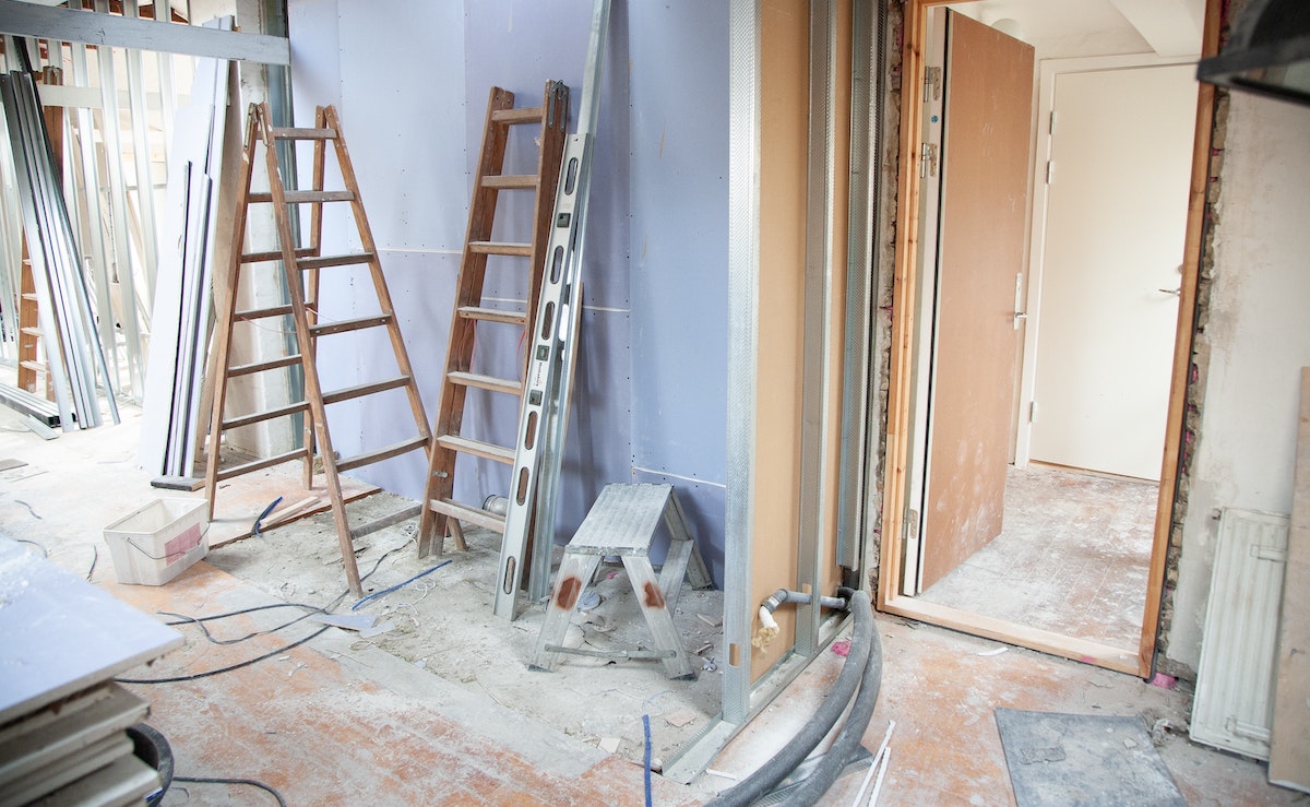 A picture of a room that's being renovated. With lumber prices in 2021 being so high and spending more time indoors, many people are turning to improving their own houses.