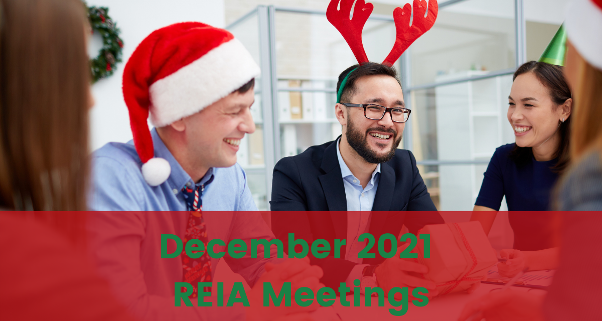 A few individuals wearing Christmas attire sit a desk behind red and green text that reads "December 2021 REIA Meetings"