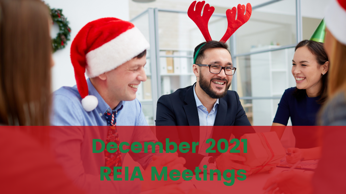 A few individuals wearing Christmas attire sit a desk behind red and green text that reads "December 2021 REIA Meetings"