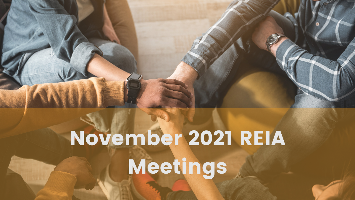 Four men handshaking with text that says November 2021 REIA Meetings