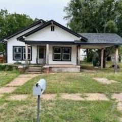 Clean Home + Extra Lot Deal.